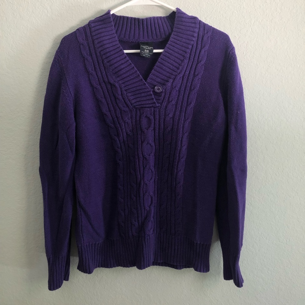 Purple rectangular cross button neck cable knit sweater.